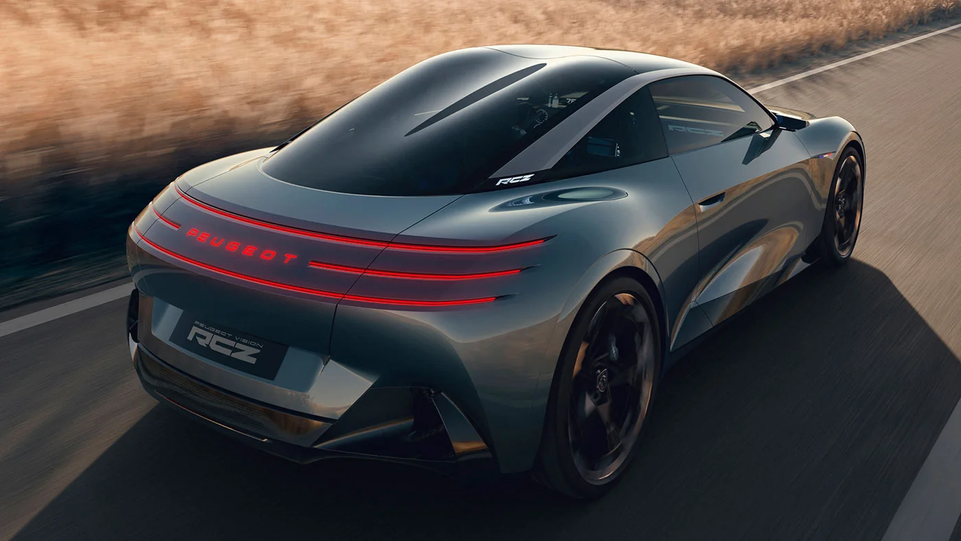 Peugeot RCZ Vision, trasera tres cuartos con barra luminosa roja, insignia RCZ VISION y techo de doble burbuja de cristal
