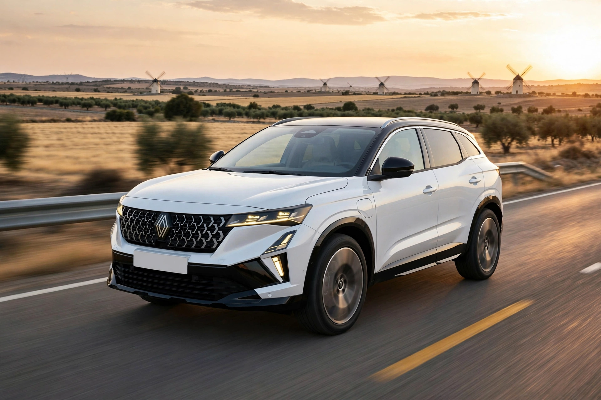 Renault Austral E-Tech en autopista por La Mancha al atardecer