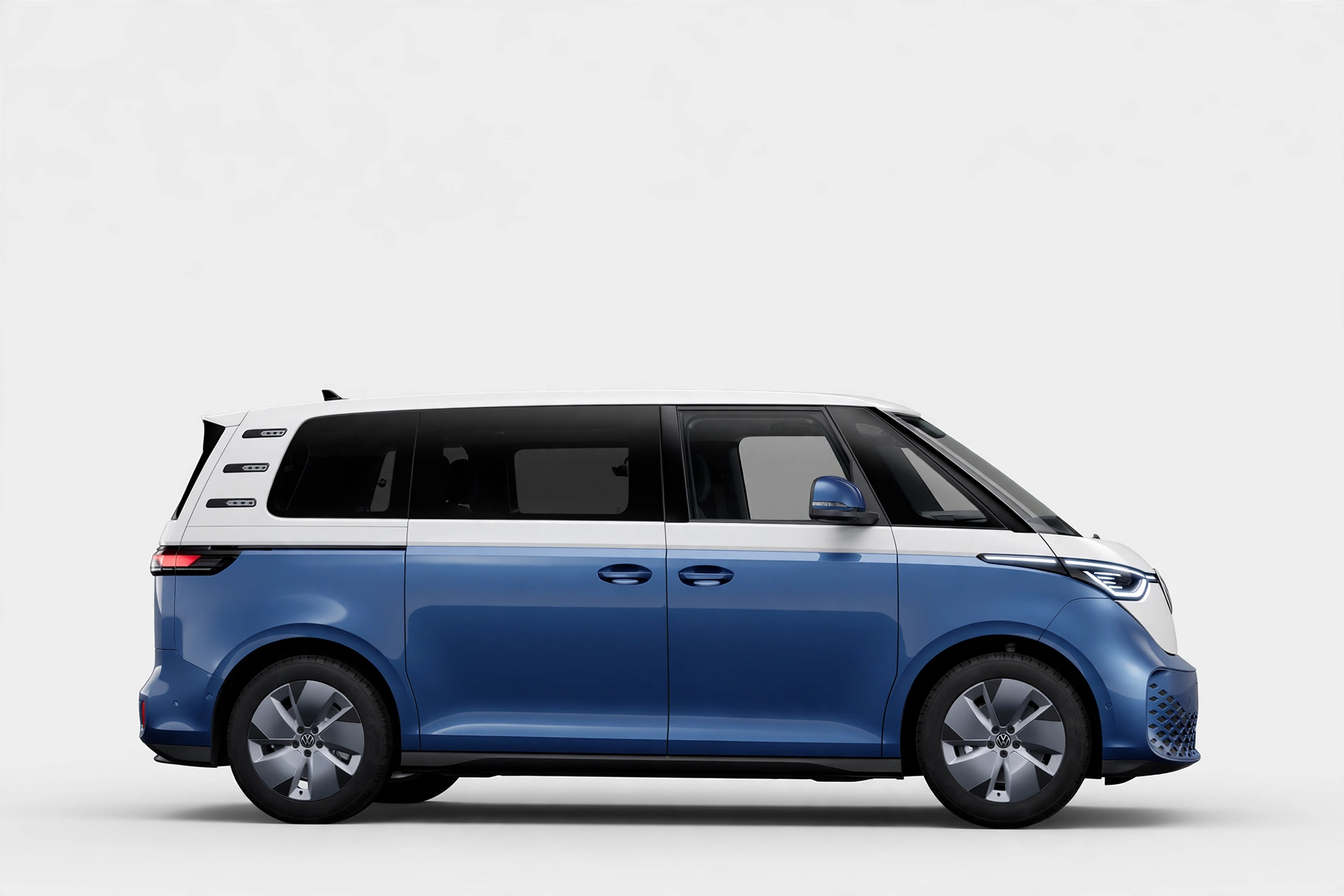 Volkswagen ID. Buzz bicolor azul y blanco, vista lateral